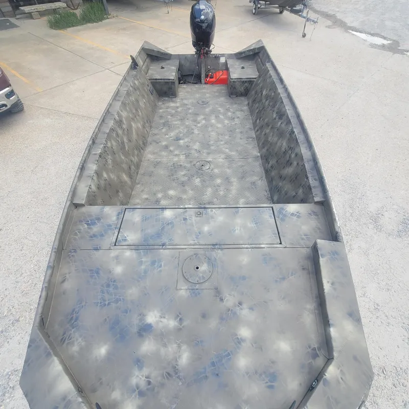 Slide: The Image of 2021 WeldBilt 2170 aluminum boat with camouflage pattern, viewed from above. - 10