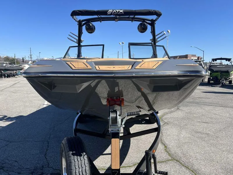 Slide: The Image of 2024 ATX Surf Boats 24 Type-S on trailer, front view. - 6