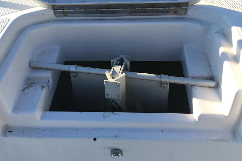 Slide: The Image of Open storage compartment of a 1998 Stratos 2100 boat. - 14