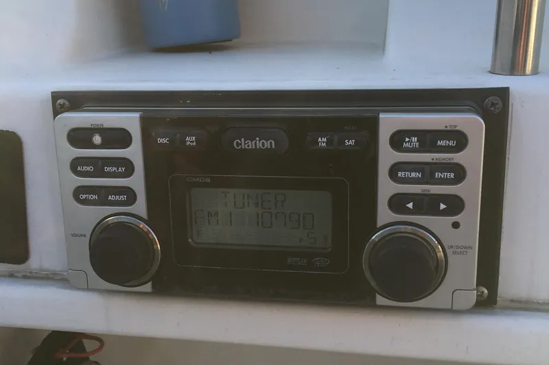 Slide: The Image of 1998 Stratos 2100 boat with Clarion marine radio system. - 16