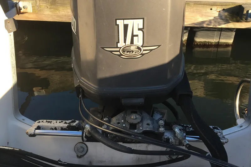 Slide: The Image of 1998 Stratos 2100 boat with a 175 horsepower outboard motor. - 18