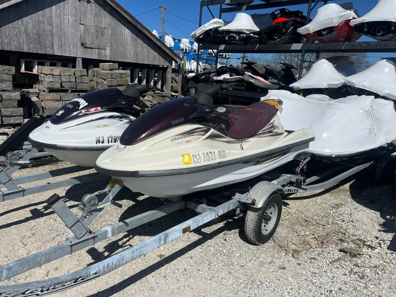 Slide: The Image of 2000 Yamaha WaveRunner XL 800 jet ski on a trailer in a storage yard. - 1