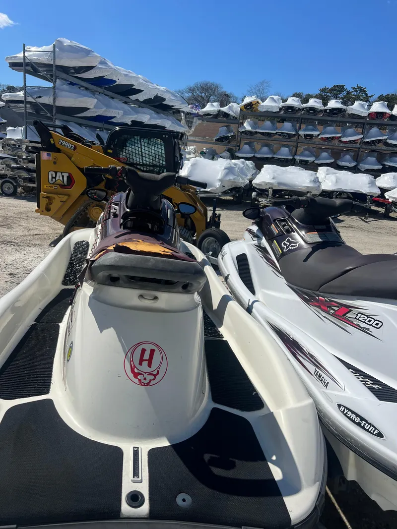 Slide: The Image of 2000 Yamaha WaveRunner XL 800 jet skis in storage lot. - 4