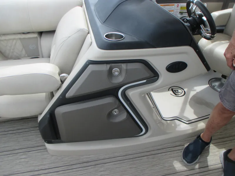 Slide: The Image of 2018 Premier 270 Intrigue RF boat interior console and seating area. - 17