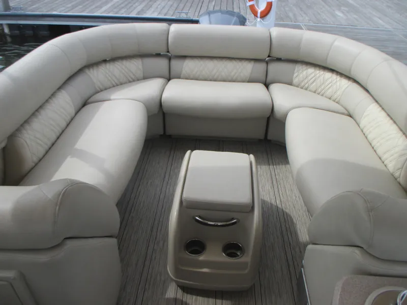 Slide: The Image of 2018 Premier 270 Intrigue RF boat with beige seating and center console. - 5