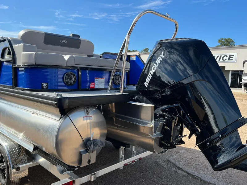 Slide: The Image of 2024 Princecraft Quorum 23 RL pontoon boat with Mercury outboard motor. - 5