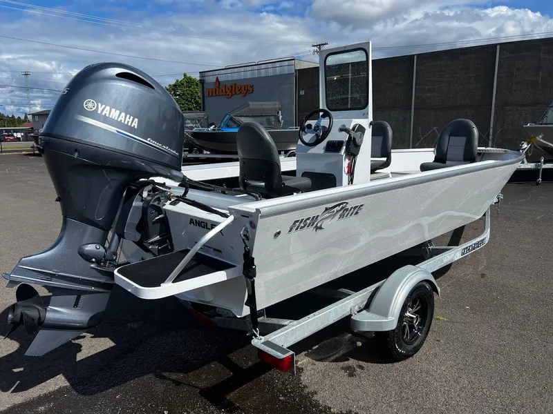 Slide: The Image of 2024 Fish Rite Angler 18 boat with Yamaha outboard motor on trailer. - 2
