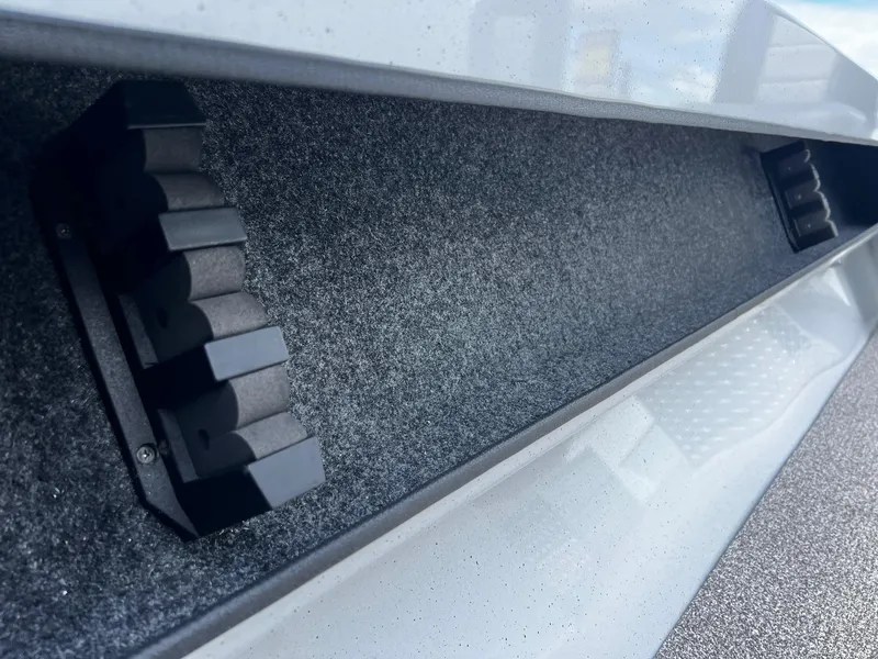 Slide: The Image of Close-up of 2024 Fish Rite Angler 18 boat interior storage compartment. - 20