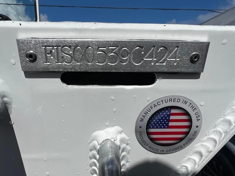 Slide: The Image of 2024 Fish Rite Angler 18 boat with HIN and Made in USA badge. - 21