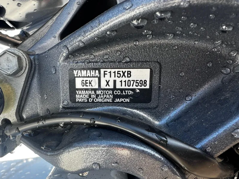 Slide: The Image of Close-up of Yamaha F115XB engine on 2024 Fish Rite Angler 18 boat. - 22