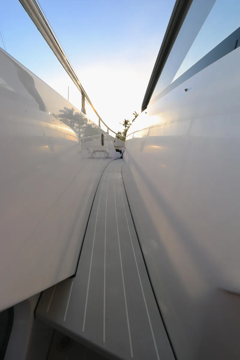 Slide: The Image of Side deck view of 2022 Azimut 47 VERVE yacht at sunset. - 10
