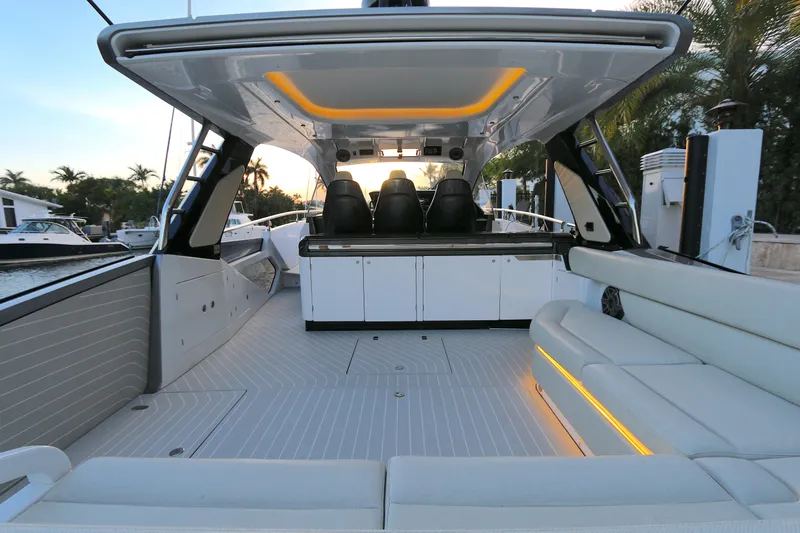 Slide: The Image of Luxurious 2022 Azimut 47 VERVE yacht interior with sleek seating and ambient lighting. - 15