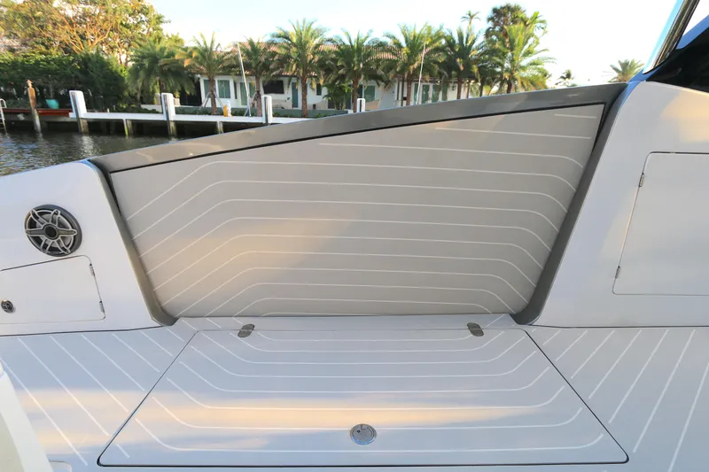 Slide: The Image of 2022 Azimut 47 VERVE yacht deck with sleek design and waterfront view. - 18