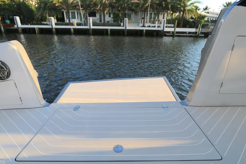 Slide: The Image of Azimut 47 VERVE 2022 yacht's rear deck with waterfront view. - 19