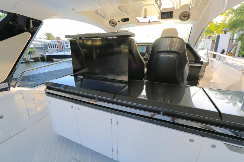 Slide: The Image of 2022 Azimut 47 VERVE yacht interior with sleek black and white design. - 21