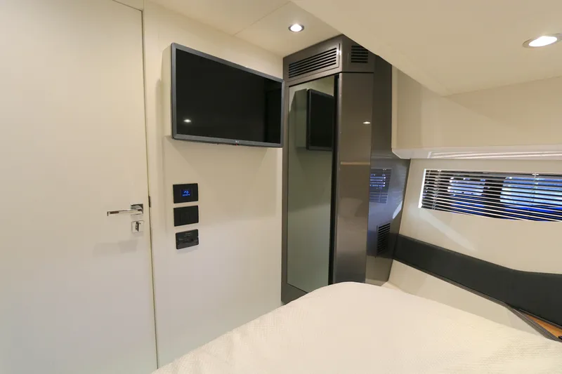 Slide: The Image of Interior of 2022 Azimut 47 VERVE yacht cabin with TV and modern design. - 5