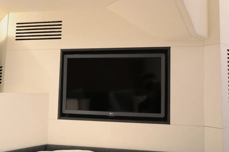 Slide: The Image of Flat-screen TV in the interior of a 2022 Azimut 47 VERVE yacht. - 9