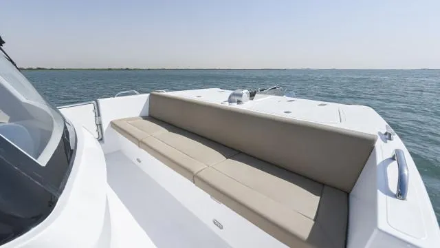 Slide: The Image of Luxurious SilverCAT 34LUX 2025 boat with spacious seating on calm waters. - 2