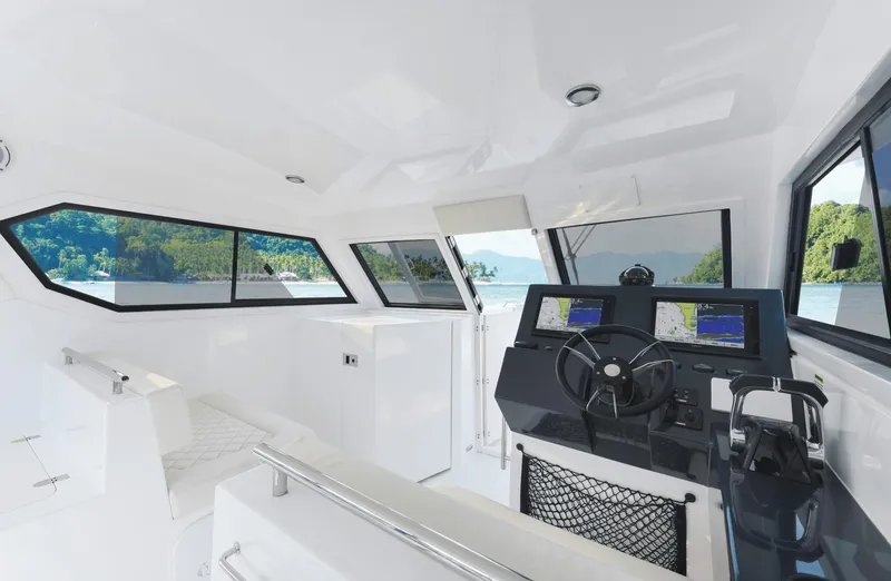 Slide: The Image of Interior of 2025 Custom SILVERCAT 34HT boat with modern navigation system. - 3