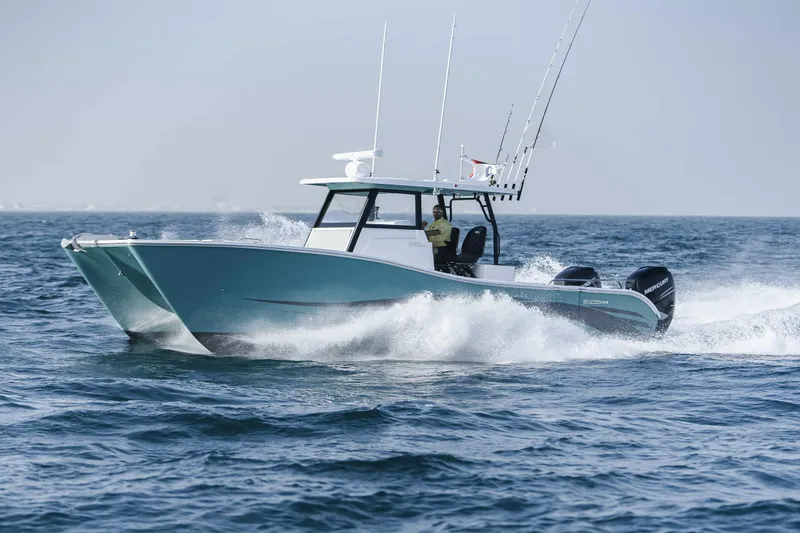 The Image of 2025 SilverCAT 34 CC boat cruising on open water, showcasing sleek design and powerful engines. - 1