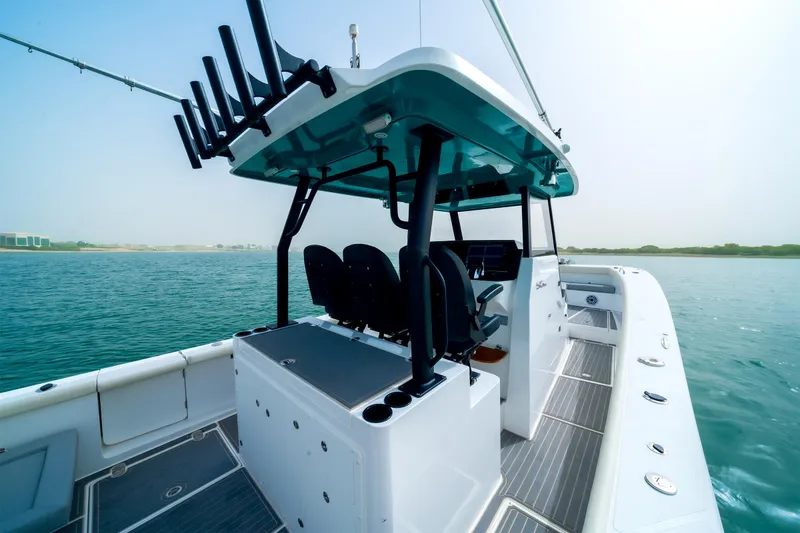 Slide: The Image of 2025 SilverCAT 34 CC boat on water, featuring sleek design and modern amenities. - 6