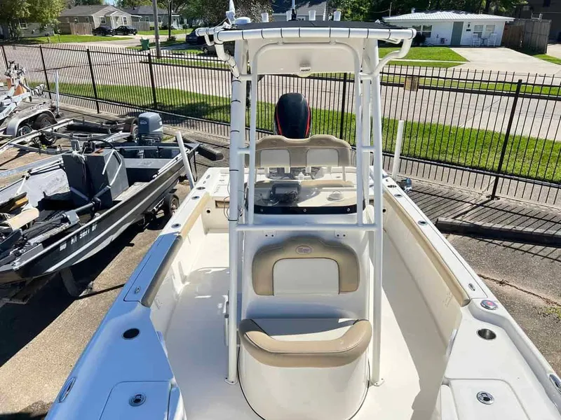 Slide: The Image of 2019 Key West 230 Bay Reef boat interior with center console and seating. - 8
