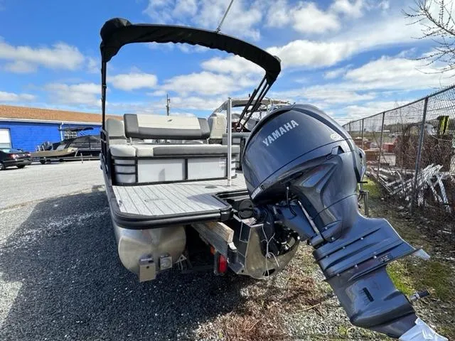 Slide: The Image of 2024 Starcraft EXS-3 Q pontoon boat with Yamaha outboard motor. - 3