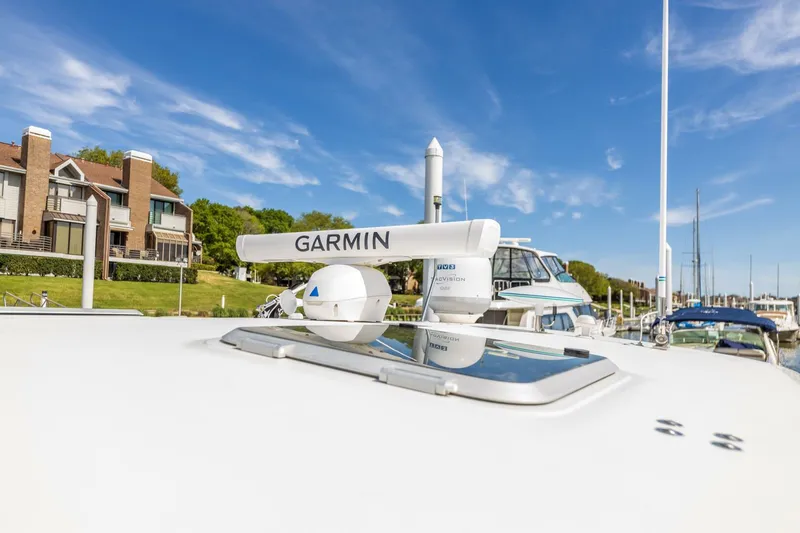 Slide: The Image of 2004 Tiara Yachts 38 Express with Garmin radar system. - 48