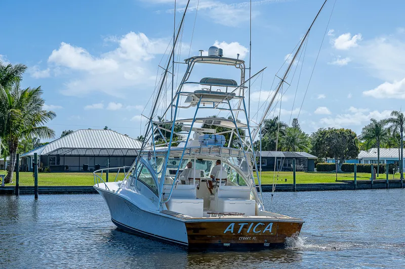 Slide: The Image of 2005 Albemarle 410 boat cruising on a sunny day. - 1