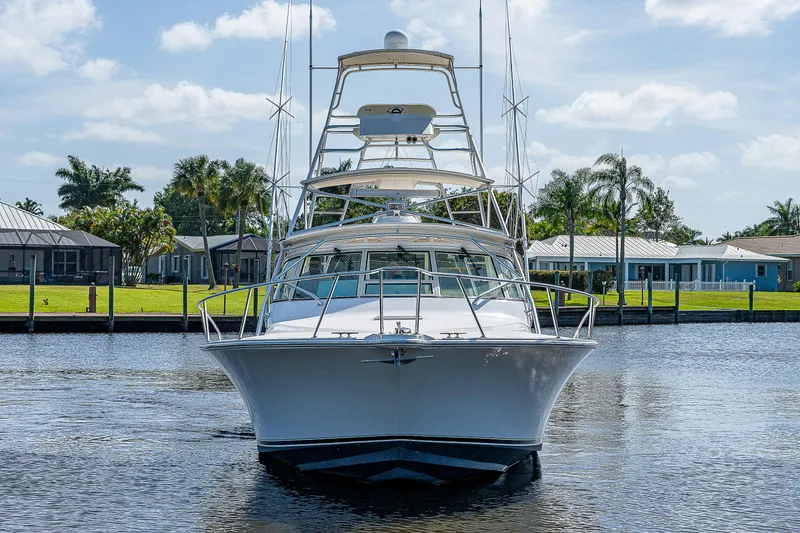 Slide: The Image of 2005 Albemarle 410 boat docked on a sunny day. - 17