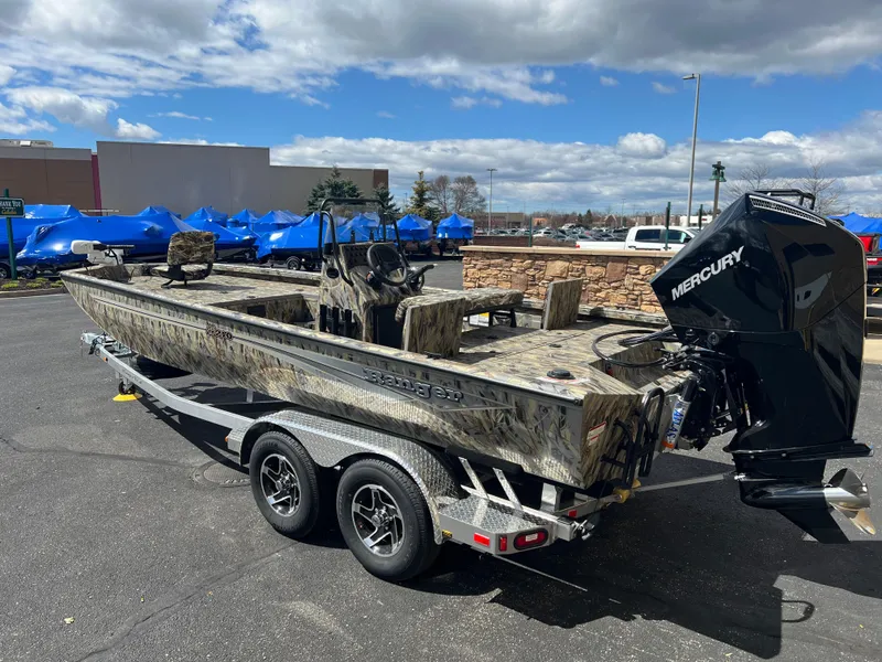 Slide: The Image of 2024 Ranger RB210 boat on trailer with Mercury outboard motor. - 2
