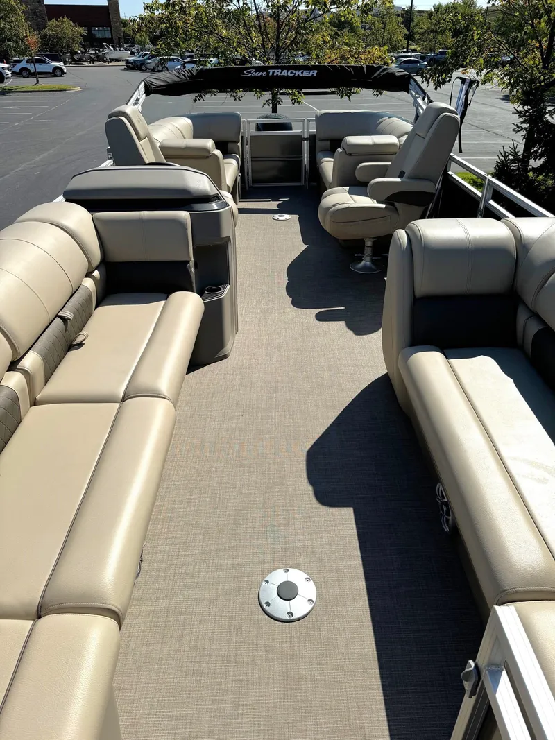 Slide: The Image of 2024 Sun Tracker Party Barge 24 DLX with spacious seating and modern design. - 3
