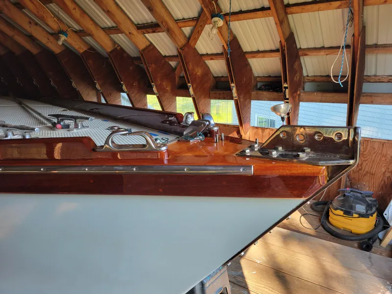 Slide: The Image of Custom Tumbleweed/Tony Skidmore 36 Fin Keel Cutter, 2000, in wooden boathouse. - 25