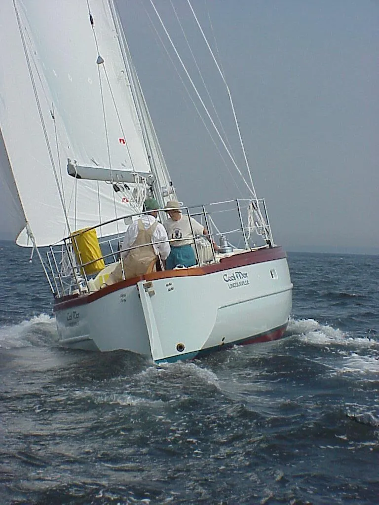 Slide: The Image of Sailing on a Custom Tumbleweed/Tony Skidmore 36 Fin Keel Cutter, 2000 model, in open waters. - 37
