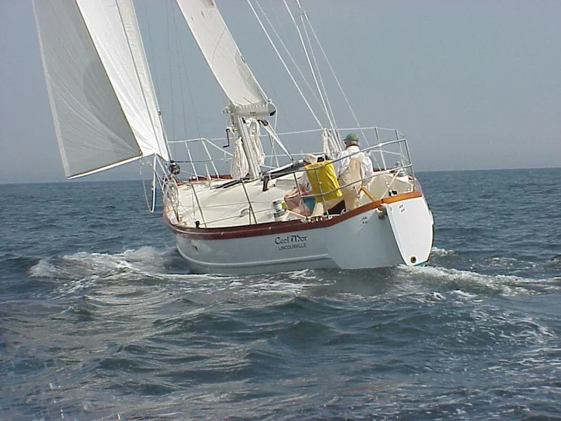 Slide: The Image of Sailing on a Custom Tumbleweed/Tony Skidmore 36 Fin Keel Cutter, 2000 model, in open waters. - 38