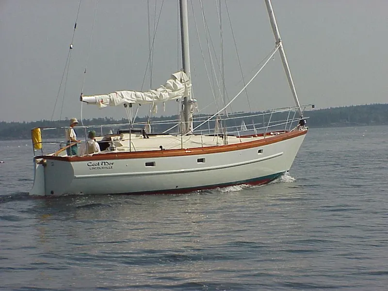 Slide: The Image of Custom Tumbleweed/Tony Skidmore 36 Fin Keel Cutter sailing on calm waters, 2000 model. - 39