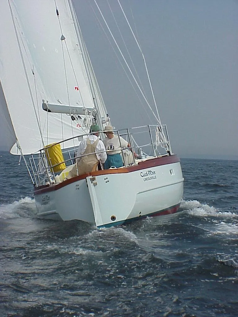 Slide: The Image of Sailing yacht Tumbleweed/Tony Skidmore 36 Fin Keel Cutter, 2000, navigating ocean waters. - 41