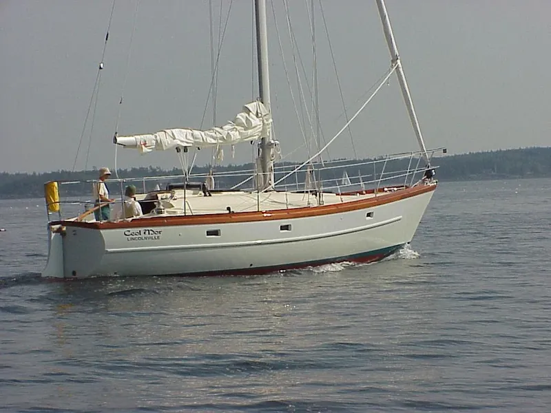 Slide: The Image of Custom Tumbleweed/Tony Skidmore 36 Fin Keel Cutter sailing on calm waters, 2000 model. - 43