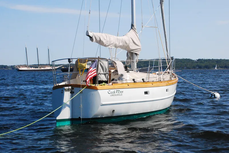 Slide: The Image of Custom Tumbleweed/Tony Skidmore 36 Fin Keel Cutter sailboat on water, 2000 model. - 44
