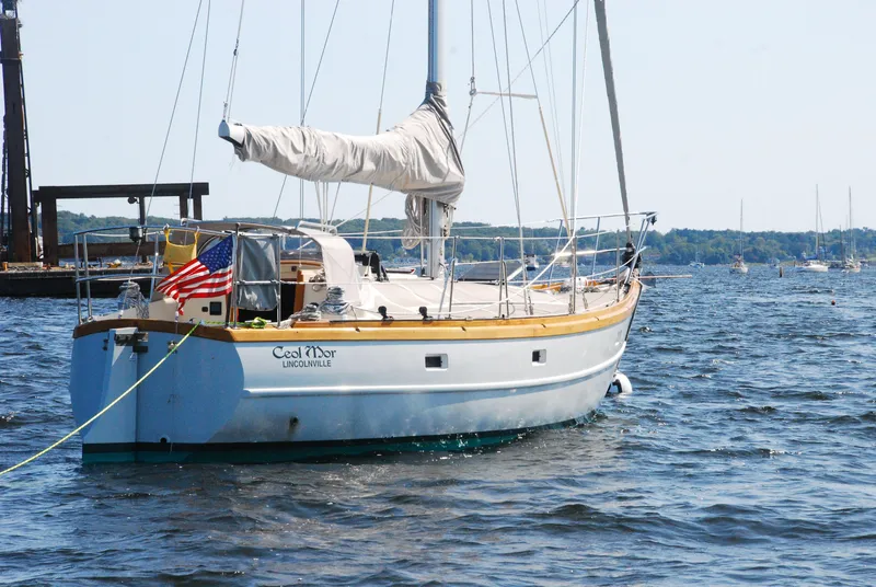 Slide: The Image of Custom Tumbleweed/Tony Skidmore 36 Fin Keel Cutter sailboat on water, 2000 model. - 47