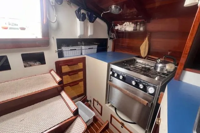 Slide: The Image of Cozy kitchen in 2000 Custom Tumbleweed/Tony Skidmore 36 Fin Keel Cutter sailboat. - 9