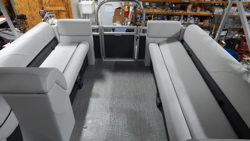 Slide: The Image of 2024 Avalon VLS Quad Lounge 21' interior with spacious seating. - 3