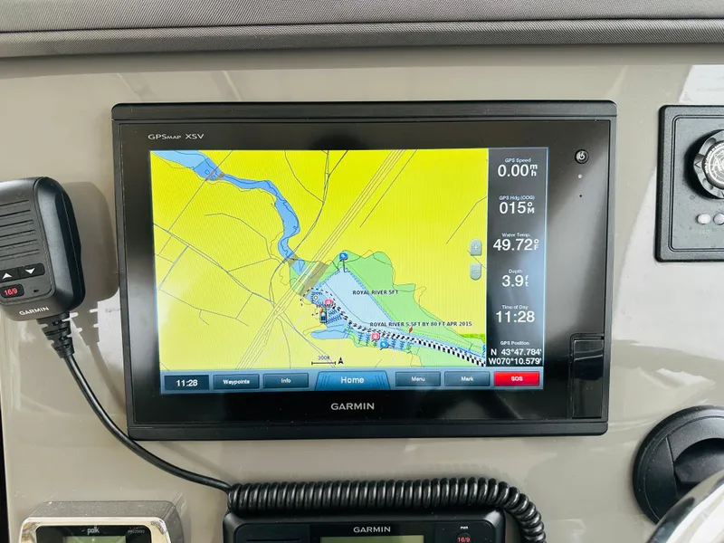 Slide: The Image of Garmin GPS display on 2017 Pursuit OS 355 boat dashboard. - 20