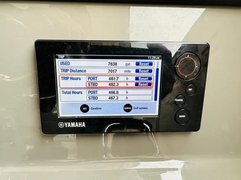Slide: The Image of Yamaha display showing trip data on 2017 Pursuit OS 355 boat. - 22