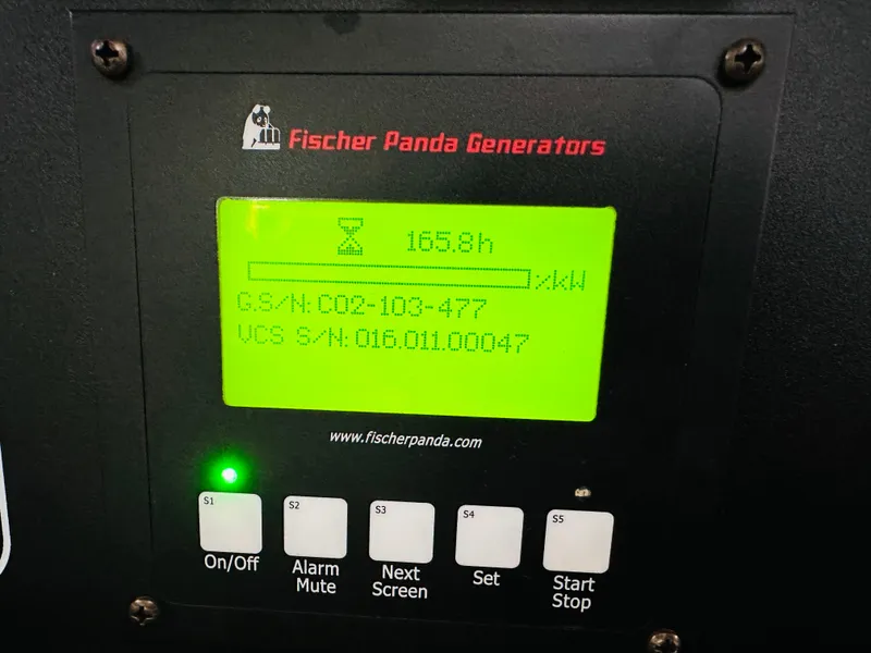 Slide: The Image of Fischer Panda Generators control panel on a 2017 Pursuit OS 355 boat. - 44