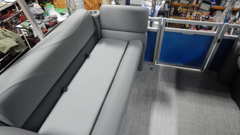 Slide: The Image of 2024 Avalon VLS Quad Lounge 21' interior with grey seating. - 5