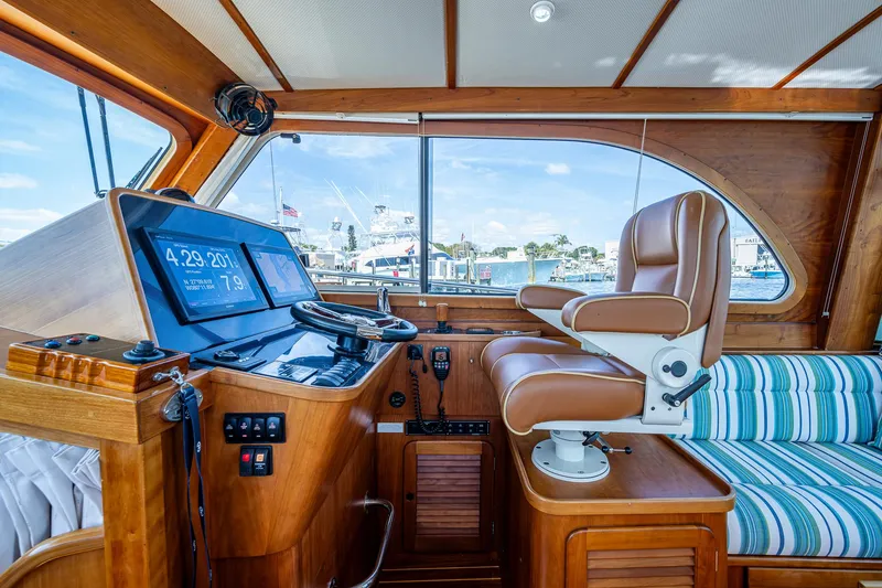 Slide: The Image of Interior of 2008 Hinckley Talaria 44 FB yacht with helm and seating area. - 17