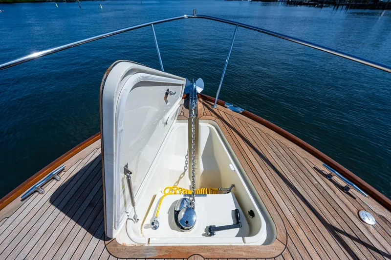 Slide: The Image of Anchor compartment on 2008 Hinckley Talaria 44 FB yacht, open on teak deck. - 36