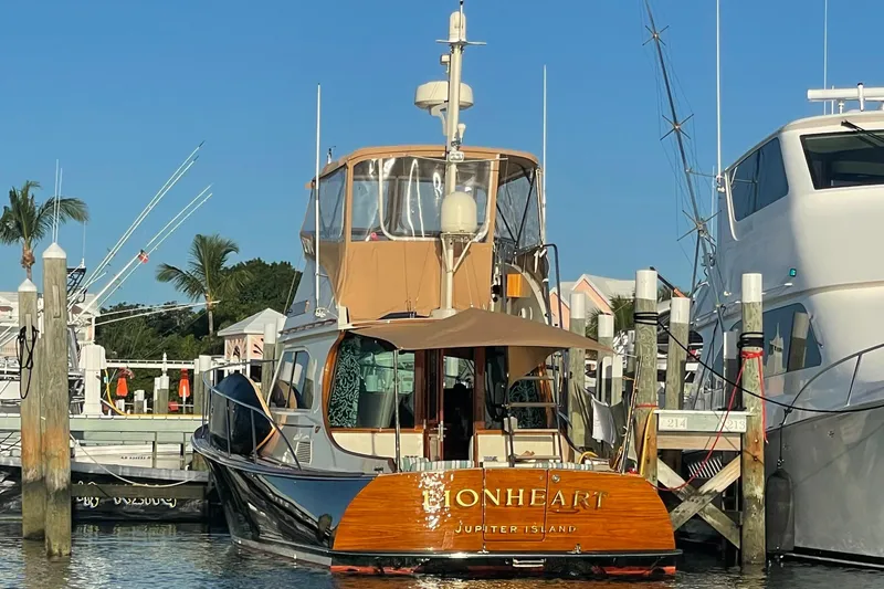 Slide: The Image of 2008 Hinckley Talaria 44 FB yacht docked at marina, sunny day. - 42
