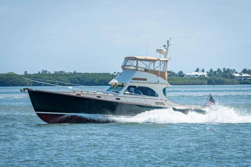 Slide: The Image of 2008 Hinckley Talaria 44 FB yacht cruising on open water. - 9